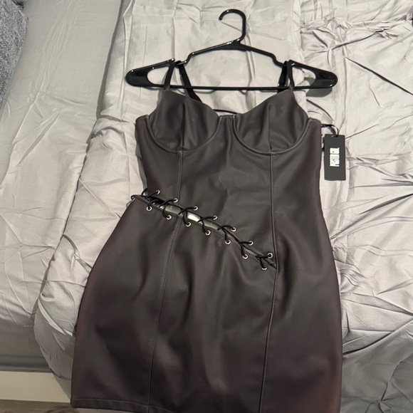 POSTER GIRL Dresses & Skirts - POSTER GIRL Black Lace-Up Faux Leather Mini Dress